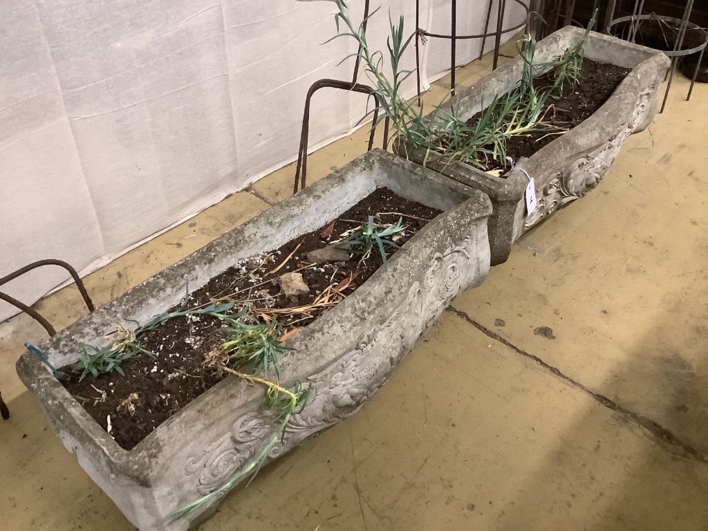 A pair of reconstituted stone serpentine front rectangular garden planters, width 73cm, depth 32cm, height 28cm